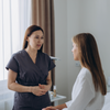 Healthcare professional with patient discussing bacterial vaginosis