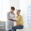 Lady doctor with patient discussing thrush infection